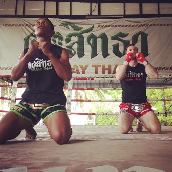 Joe Gebbia and Sueadam “Black Tiger” Khongsittha doing the Wai Kru to pay respect to their teachers.